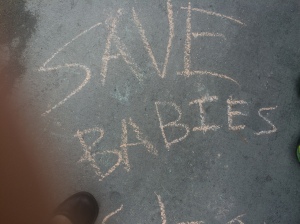 Drawn on sidewalk outside Planned Parenthood by a 6-year old girl.
